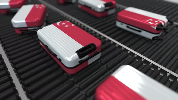 Suitcases Featuring Flag of Singapore on Roller Conveyer