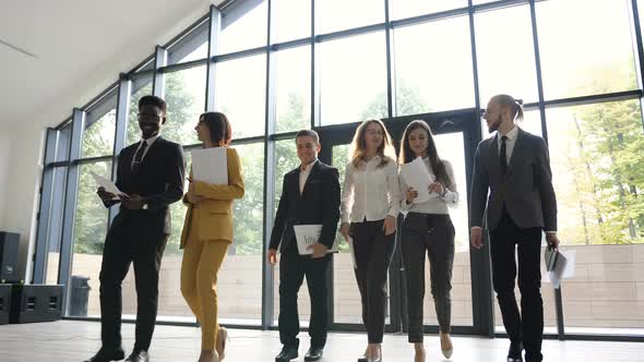 Portrait of a Group of Young Multiethnic Business People Going to Conference 