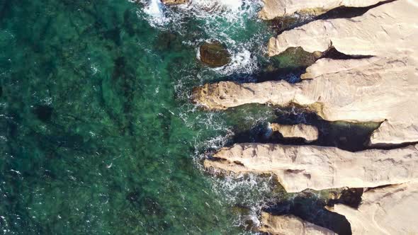 Nature Sea Waves on the Rocky Coast Water Texture Aerial View Over the Ocean Cyprus