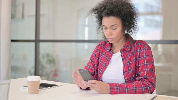 African Woman Using Smartphone