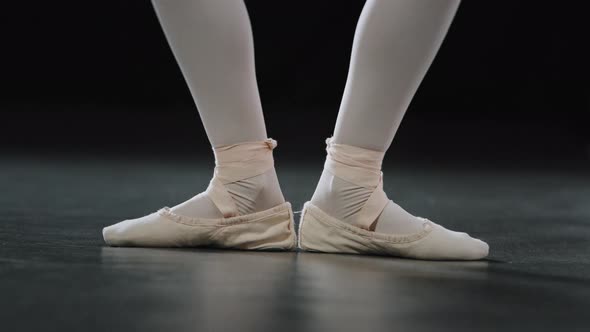 Unrecognizable Girl Dancer Ballerina Female Legs Rise Lifting Up Pointe Doing Ballet Exercise