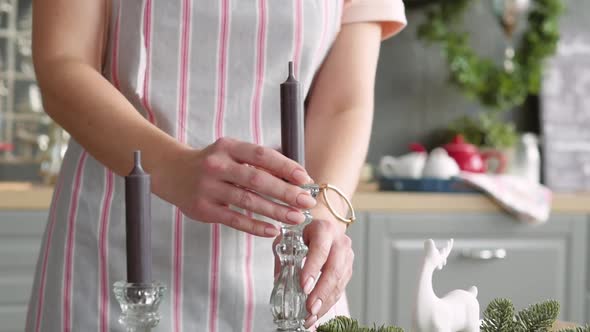 Christmas Table Decoration. Festive Table Setting. Female Hands Decorate the Table for Christmas