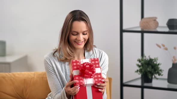 Portrait Cute Smiling Lady Opening Festive Red Gift Box Posing Rejoicing