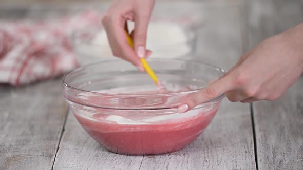 Baker Making Berry Mousse For Cake