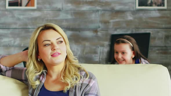 Slow Motion Shot of Adorable Daughter Hugging Her Mother From Behind