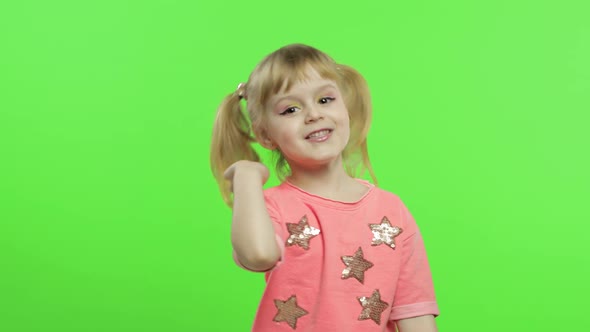Positive Child in Pink Blouse Waving Her Hands and Tells Something. Chroma Key