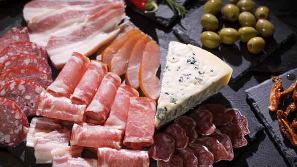 Restaurant Meat Platter (Ham, Salami, Bacon) on the Black Stone Tray