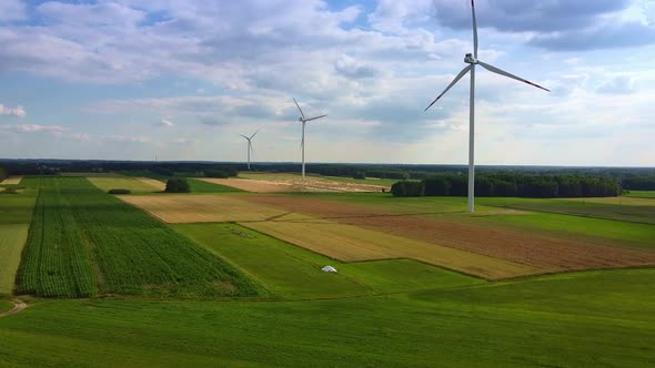 Line of Wind Energy Turbines in Summer