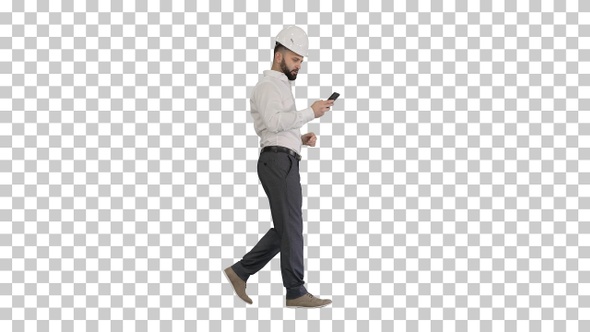 Engineer walking and using smartphone, Alpha Channel
