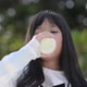 Cute Asian Child Drinking Milk From Bottle - VideoHive Item for Sale