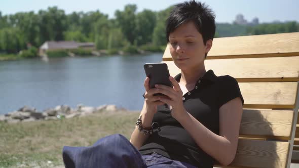 Girl Using Touch Screen Cellular