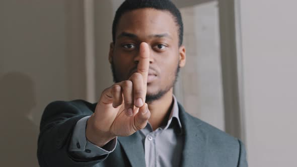 Young African American Lawyer in Suit Man Standing in Office Waving Index Finger Showing NO Gesture