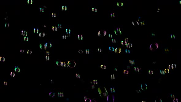 Medium Soap Bubbles Spinning, Black Background