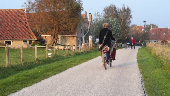 woman on a carrier bicycle