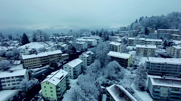 Aerial View of Village Houses at Winter Snow Season