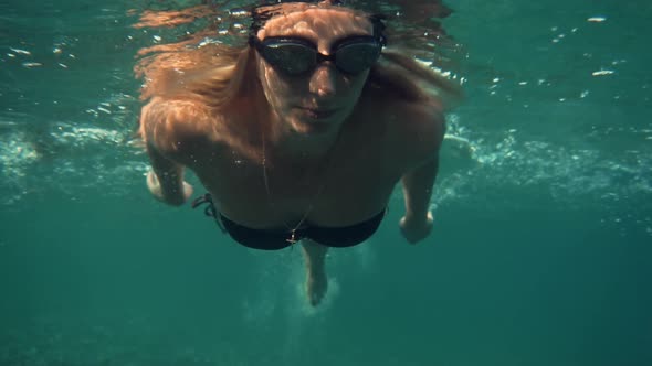 Underwater  Swim Bikini Woman. Air Bubbles In Water. Girl Having Fun Sea. Vacation Turkey Trip.