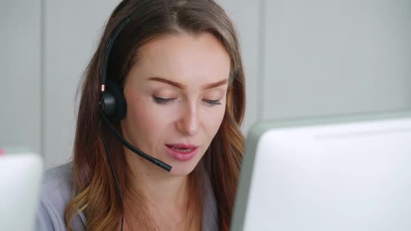 Business People Wearing Headset Working in Office