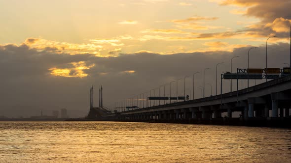 Timelapse dramatic sunrise ray over Bridge