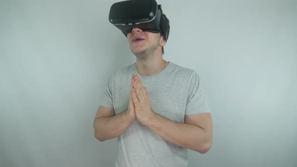 Young Man Uses Modern Technologies Of Virtual Reality
