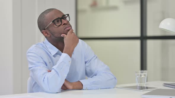 Pensive African Man Thinking Work