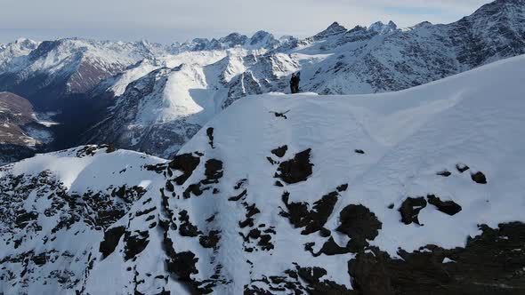 Aerial View of Cheget Mountain Range in Snow in Winter in Sunny Clear Weather