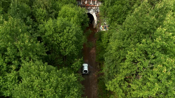 Aerial View of the Car Entering the Tunnel