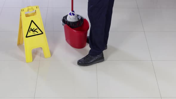 Cleaner With Broom Sweeping Floor And Cleaning Mopping