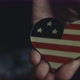 Female Hand Holding A USA Flag Badge. - VideoHive Item for Sale