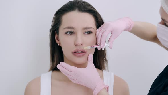 Portrait of Woman Having Botox Injection in Beauty Salon