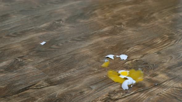 Falling and Breaking an Egg on Laminate