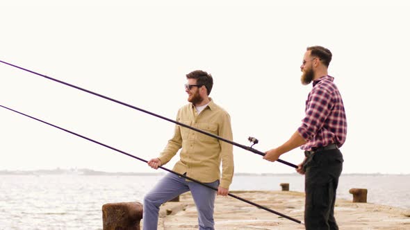 Happy Friends with Fishing Rods on Pier 14