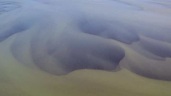 Large Olfusa River Had Silted Up And Make Beautiful Pattern In South Iceland. Aerial Sideways Shot