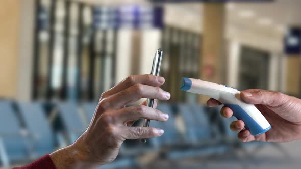 Passenger Handing Phone to Staff for Checkin Scanning