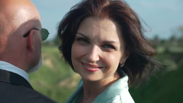 Headshot Portrait of Smiling Attractive Woman Looking at Camera Turning Admiring Nature with Man