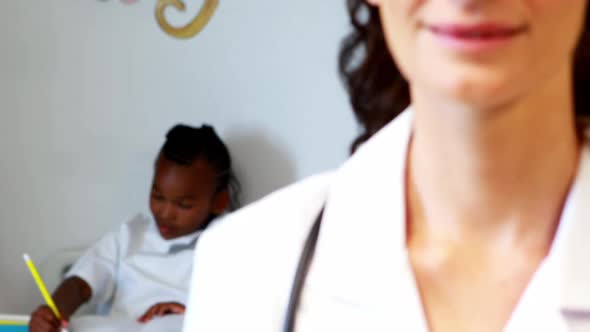 Female doctor standing in hospital