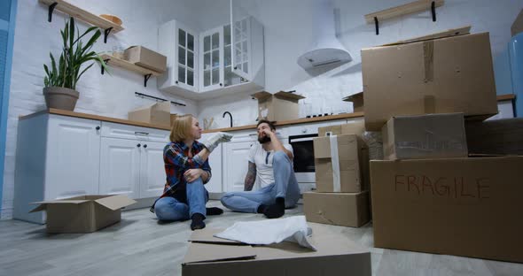 Young Couple Moving in Their New Home