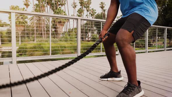 Athlete man working out in the park