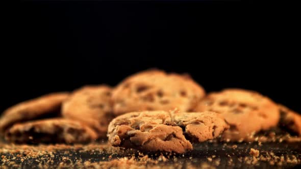 Cookies with Pieces of Chocolate Fall on the Table