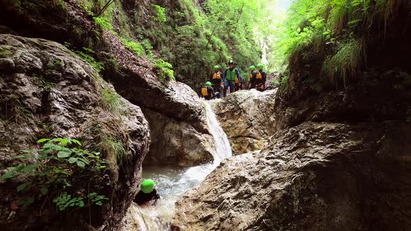 Aerial view of a group of people canyoning in Soca river, Slovenia