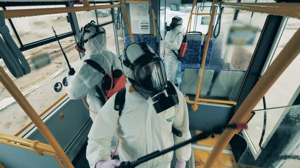 Workers Disinfect One Bus During Covid-19 Pandemic.