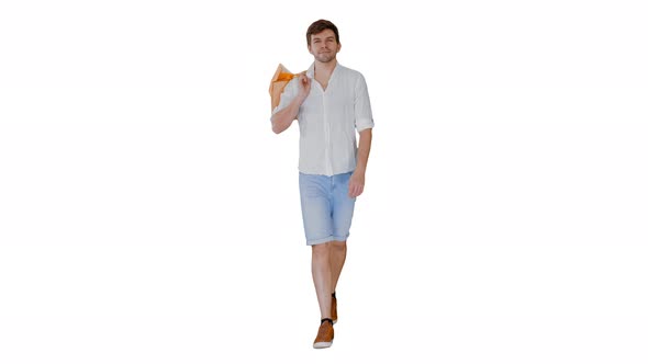 Handsome Man in Casual Clothes Walking with Shopping Bags Looking at Camera on White Background