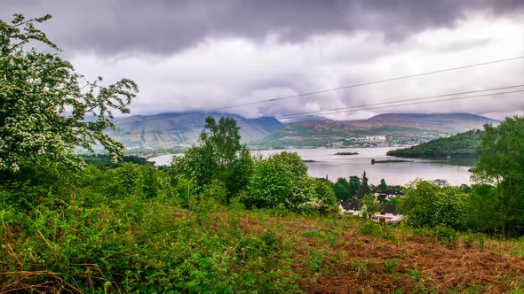 Cinematic timelapse of scottish village with mountain view