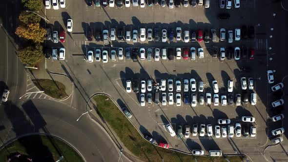 Aerial View of Parking with Parked Cars