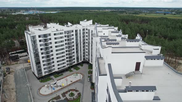 Aerial View of a Newly Modern MultiStorey Building in a Forest Area