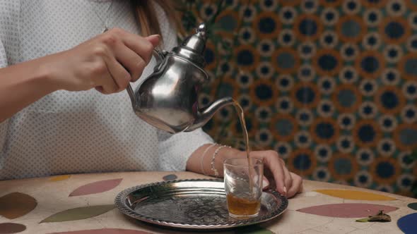 Close Up Macro Woman Hands Pouring Make Traditional Maroccan Tea, Metal Teapot
