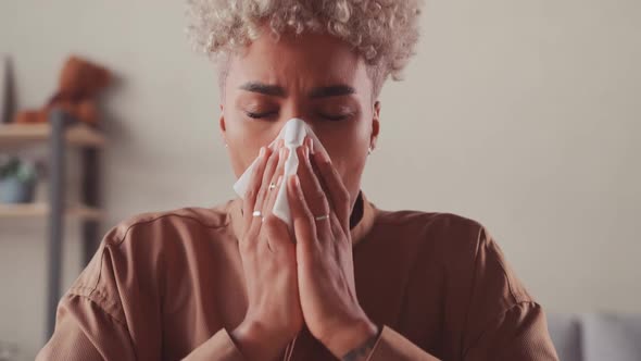 Ill Allergic Young African Woman Sneezing in Paper Tissue Blowing Running Nose
