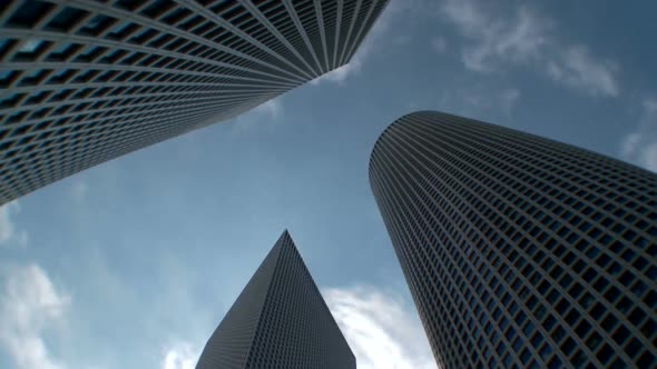 Time lapse of clouds from a low angle shot of skyscrapers in Tel Aviv