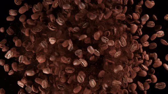 Super Slow Motion Shot of Rotating Coffee Beans and Powder Explosion at 1000Fps alt