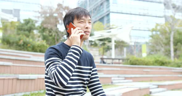 Man Use of Cellphone at Outdoor