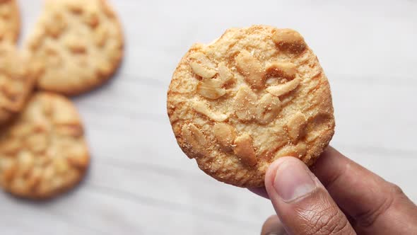 Close Up of Hand Hold a Peanut Sweet Cookies